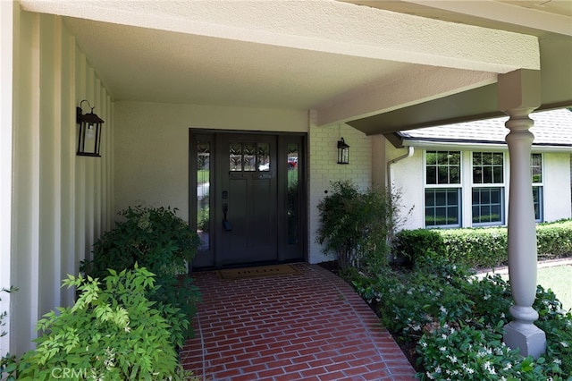 2521 Wildrose Ln, Upland, CA 91784 - property entrance featuring brick siding and stucco siding