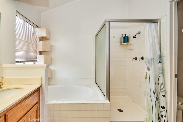 9615 Shadow Springs Dr, Moreno Valley, CA 92557 - full bathroom with a stall shower, a garden tub, vanity, and toilet