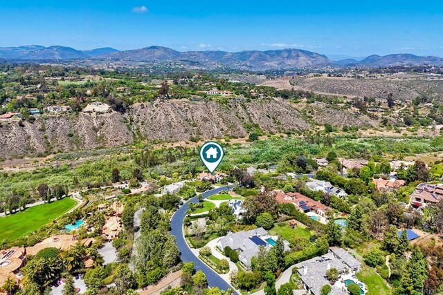 6039 Calle Camposeco, Rancho Santa Fe, CA 92067 - aerial overview of property's location with a mountainous background