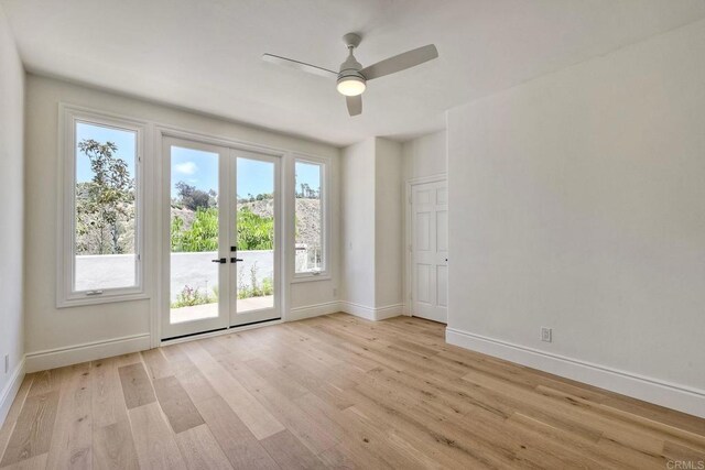 6039 Calle Camposeco, Rancho Santa Fe, CA 92067 - empty room featuring french doors, light wood-type flooring, baseboards, and a ceiling fan