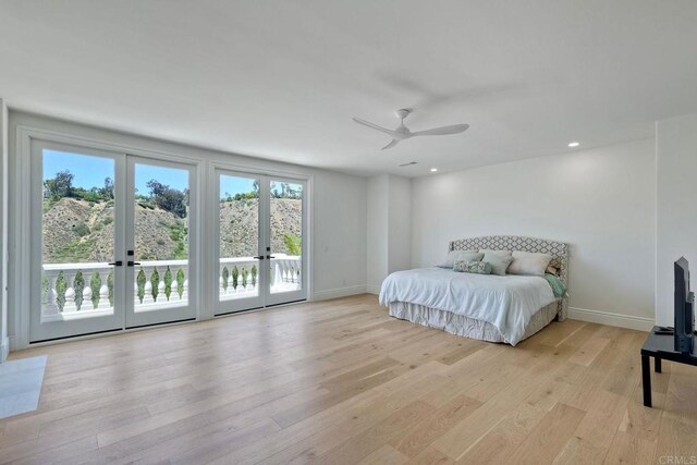 6039 Calle Camposeco, Rancho Santa Fe, CA 92067 - bedroom with access to exterior, light wood finished floors, baseboards, french doors, and recessed lighting