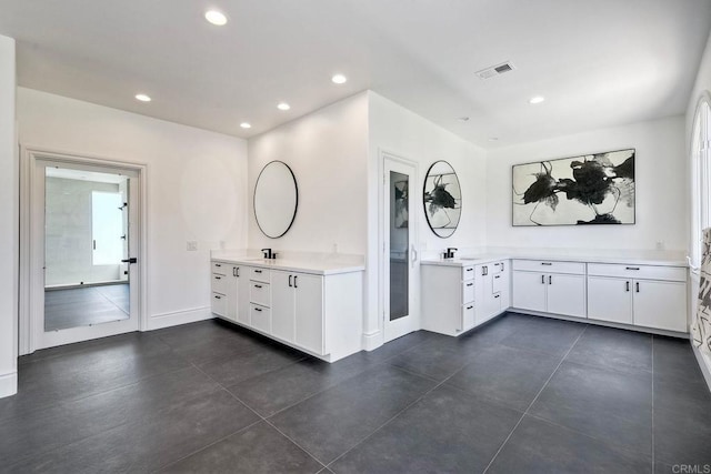 6039 Calle Camposeco, Rancho Santa Fe, CA 92067 - bathroom with recessed lighting, two vanities, and baseboards
