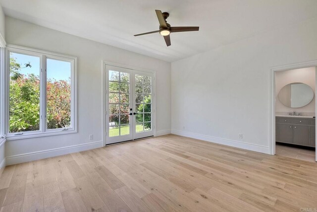 6039 Calle Camposeco, Rancho Santa Fe, CA 92067 - spare room featuring light wood-style flooring, a ceiling fan, french doors, baseboards, and a sink