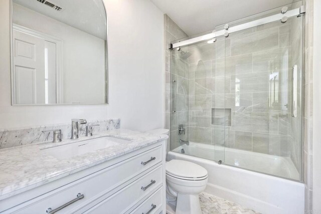 6039 Calle Camposeco, Rancho Santa Fe, CA 92067 - full bathroom featuring toilet, vanity, and bath / shower combo with glass door