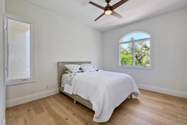 6039 Calle Camposeco, Rancho Santa Fe, CA 92067 - bedroom featuring light wood-style floors, baseboards, and ceiling fan