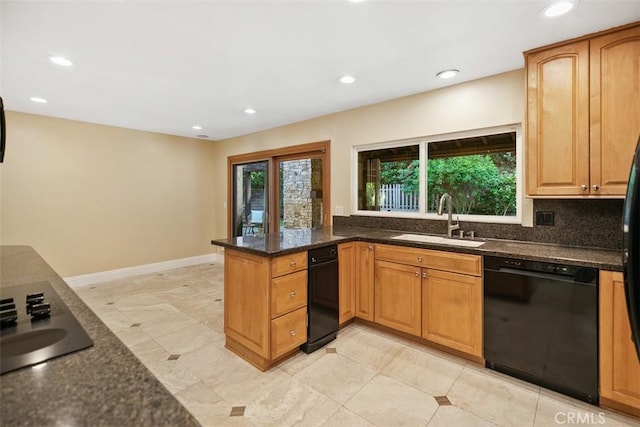 25412 Hugo Rd, Laguna Niguel, CA 92677 - kitchen featuring black appliances, a peninsula, recessed lighting, dark stone counters, and backsplash