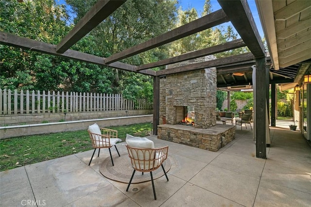 25412 Hugo Rd, Laguna Niguel, CA 92677 - view of patio featuring an outdoor stone fireplace