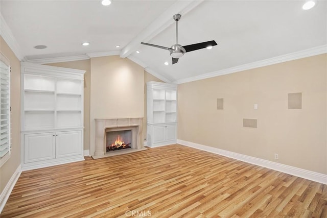 25412 Hugo Rd, Laguna Niguel, CA 92677 - unfurnished living room with light wood-style flooring, ceiling fan, a fireplace with flush hearth, recessed lighting, and crown molding