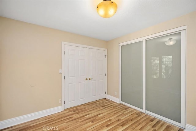 25412 Hugo Rd, Laguna Niguel, CA 92677 - unfurnished bedroom featuring light wood finished floors and a closet