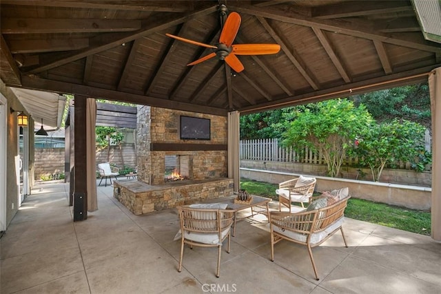 25412 Hugo Rd, Laguna Niguel, CA 92677 - fenced backyard featuring a gazebo, a patio, a ceiling fan, and an outdoor living space with a fireplace