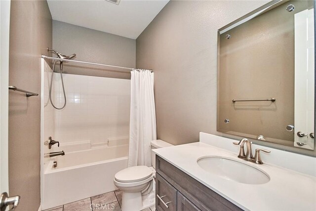 894 Harvest Ave, Upland, CA 91786 - full bathroom featuring toilet, tile patterned flooring, vanity, and shower / tub combo with curtain
