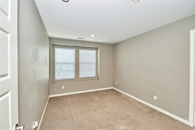 894 Harvest Ave, Upland, CA 91786 - carpeted empty room with baseboards