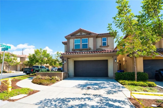 894 Harvest Ave, Upland, CA 91786 - view of front of house featuring stucco siding, a garage, driveway, and a tile roof