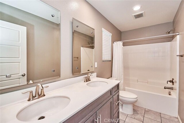 894 Harvest Ave, Upland, CA 91786 - full bathroom featuring tile patterned flooring, shower / bathtub combination with curtain, toilet, and double vanity