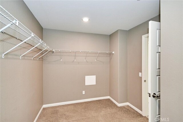 894 Harvest Ave, Upland, CA 91786 - walk in closet with carpet floors