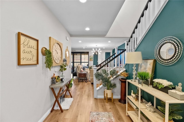 36438 Geranium Dr, Lake Elsinore, CA 92532 - entrance foyer with baseboards, light wood-type flooring, a chandelier, stairway, and recessed lighting