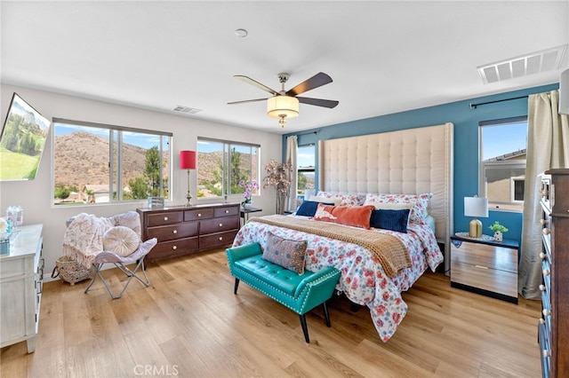 36438 Geranium Dr, Lake Elsinore, CA 92532 - bedroom featuring light wood-type flooring and ceiling fan