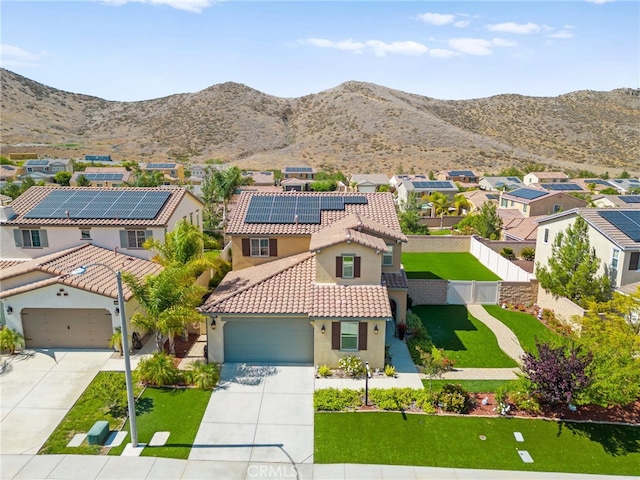 36438 Geranium Dr, Lake Elsinore, CA 92532 - view of front facade with stucco siding, a tile roof, a residential view, and concrete driveway