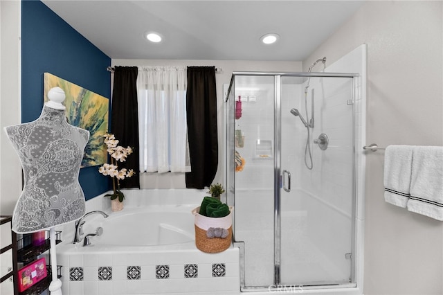 36438 Geranium Dr, Lake Elsinore, CA 92532 - bathroom featuring a shower stall, a garden tub, and recessed lighting