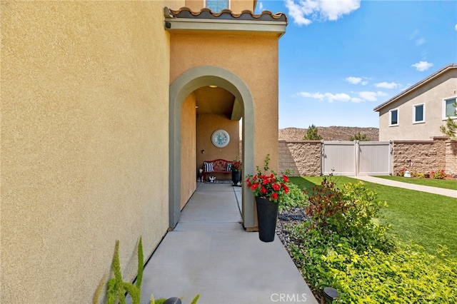 36438 Geranium Dr, Lake Elsinore, CA 92532 - doorway to property with stucco siding