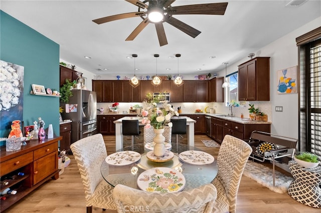 36438 Geranium Dr, Lake Elsinore, CA 92532 - dining space with a ceiling fan, light wood-style floors, and recessed lighting