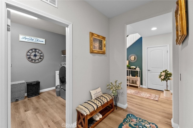 36438 Geranium Dr, Lake Elsinore, CA 92532 - corridor featuring light wood-style flooring, baseboards, and recessed lighting