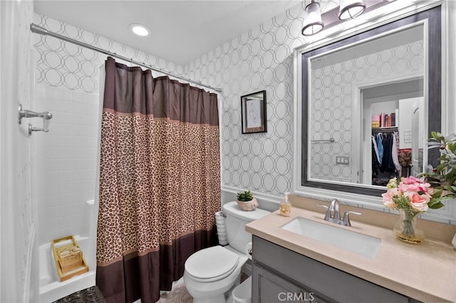 36438 Geranium Dr, Lake Elsinore, CA 92532 - full bath with wallpapered walls, toilet, vanity, and shower / tub combo