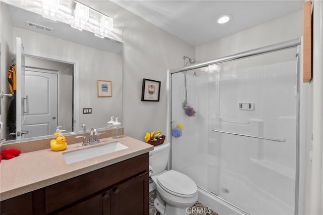 36438 Geranium Dr, Lake Elsinore, CA 92532 - full bathroom featuring toilet, a shower stall, vanity, and recessed lighting