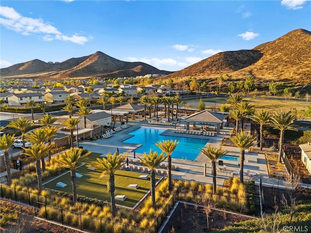 36438 Geranium Dr, Lake Elsinore, CA 92532 - community pool with fence, a mountain view, and a patio