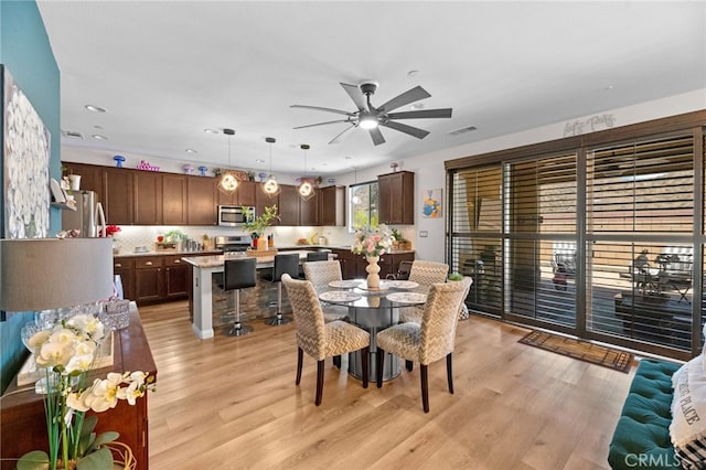 36438 Geranium Dr, Lake Elsinore, CA 92532 - dining space with a ceiling fan, recessed lighting, and light wood-type flooring
