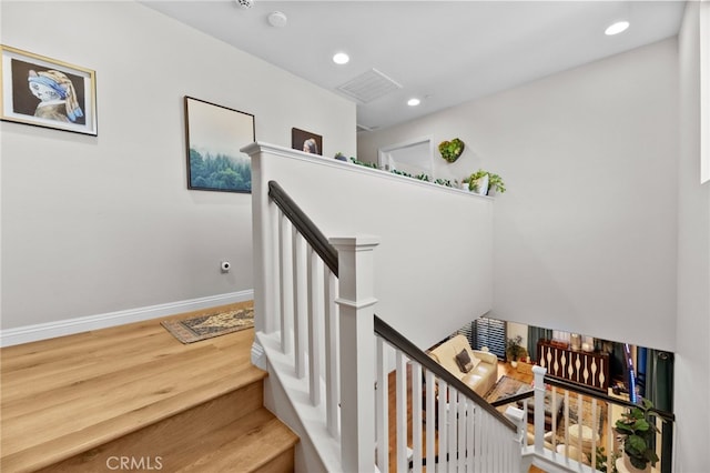 36438 Geranium Dr, Lake Elsinore, CA 92532 - staircase with recessed lighting, baseboards, and wood finished floors