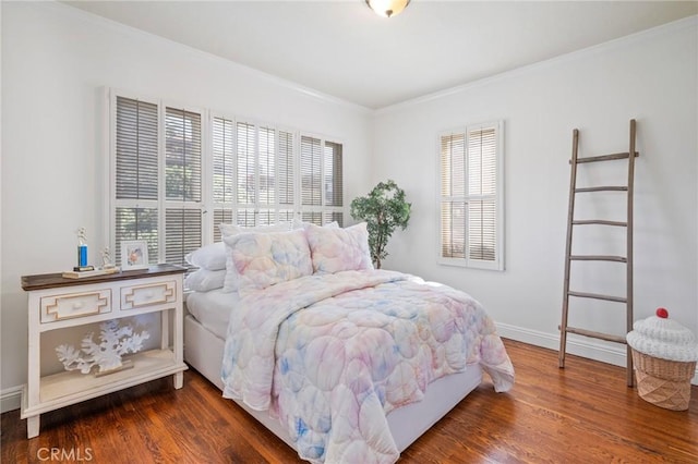 872 W 21st St, San Pedro, CA 90731 - bedroom featuring multiple windows, dark wood finished floors, crown molding, and baseboards