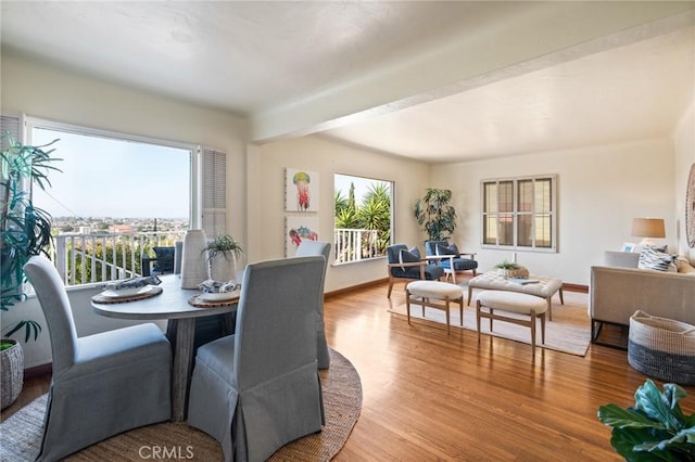 872 W 21st St, San Pedro, CA 90731 - dining room featuring wood finished floors, baseboards, and beamed ceiling