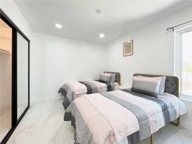 445 E San Rafael Dr, Palm Springs, CA 92262 - bedroom featuring light marble finish flooring and recessed lighting