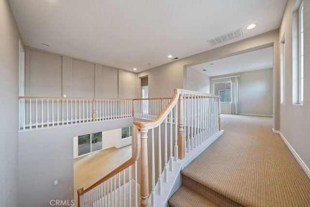 32475 Corte Barela, Temecula, CA 92592 - hallway featuring carpet floors, recessed lighting, baseboards, healthy amount of natural light, and an upstairs landing
