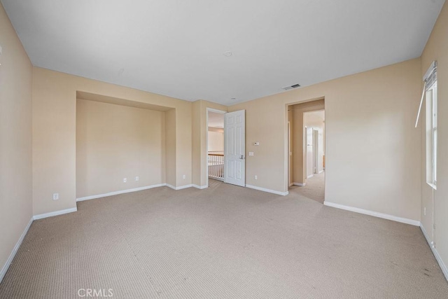 32475 Corte Barela, Temecula, CA 92592 - unfurnished bedroom featuring light carpet and baseboards