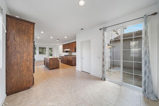 32475 Corte Barela, Temecula, CA 92592 - unfurnished living room with recessed lighting, baseboards, and light tile patterned flooring