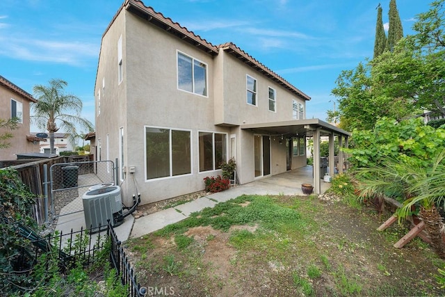 32475 Corte Barela, Temecula, CA 92592 - back of property with stucco siding, cooling unit, a patio area, and a fenced backyard