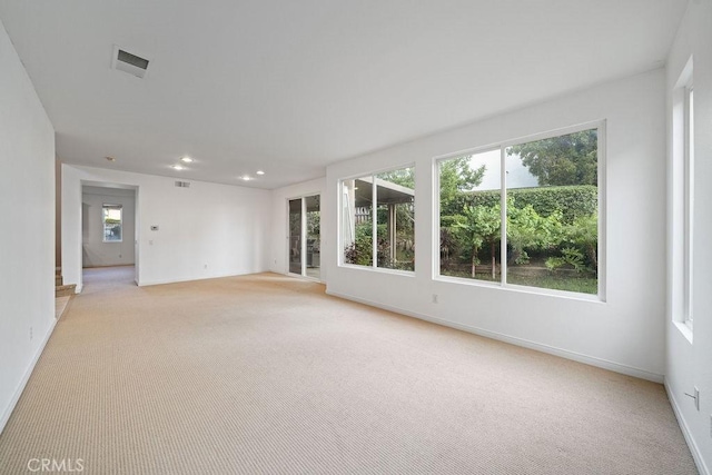 32475 Corte Barela, Temecula, CA 92592 - spare room featuring light carpet, baseboards, and recessed lighting