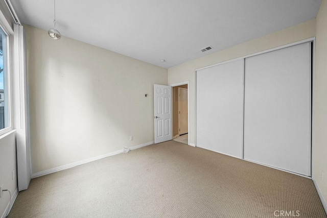 32475 Corte Barela, Temecula, CA 92592 - unfurnished bedroom featuring carpet, baseboards, and multiple windows