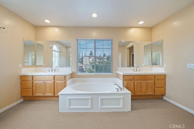 32475 Corte Barela, Temecula, CA 92592 - bathroom with two vanities, a bath, carpet flooring, and recessed lighting