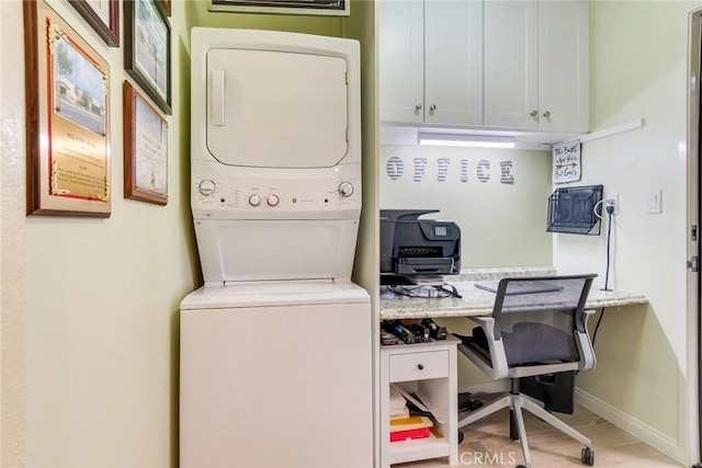 4329 Junction St Unit 103, Corona, CA 92883 - home office featuring stacked washer / dryer and baseboards