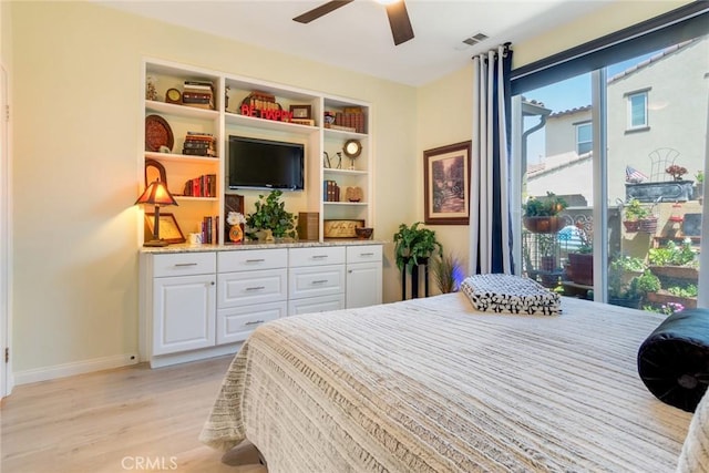 4329 Junction St Unit 103, Corona, CA 92883 - bedroom with light wood-style floors, baseboards, and a ceiling fan