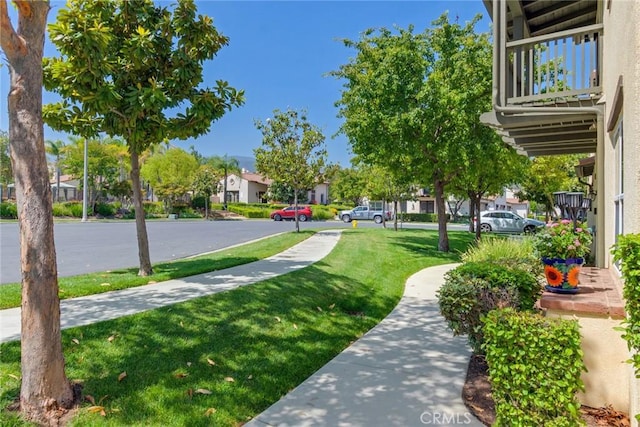 4329 Junction St Unit 103, Corona, CA 92883 - surrounding community featuring a lawn and a residential view