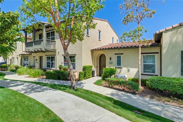 4329 Junction St Unit 103, Corona, CA 92883 - view of property featuring stucco siding and a tile roof