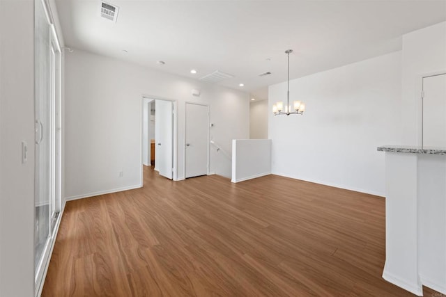 1712 Santa Christina Ave Unit 1, Chula Vista, CA 91913 - spare room featuring wood finished floors, a chandelier, baseboards, and recessed lighting