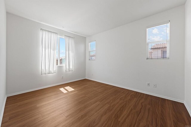 1712 Santa Christina Ave Unit 1, Chula Vista, CA 91913 - empty room featuring dark wood-type flooring and baseboards
