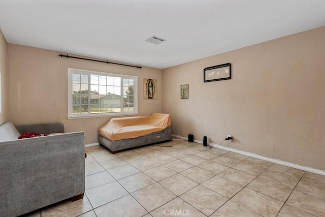 1030 Perrisito St, Perris, CA 92570 - bedroom with baseboards and light tile patterned floors