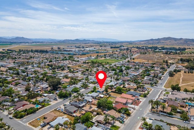 1030 Perrisito St, Perris, CA 92570 - aerial view of property's location featuring a mountainous background and nearby suburban area