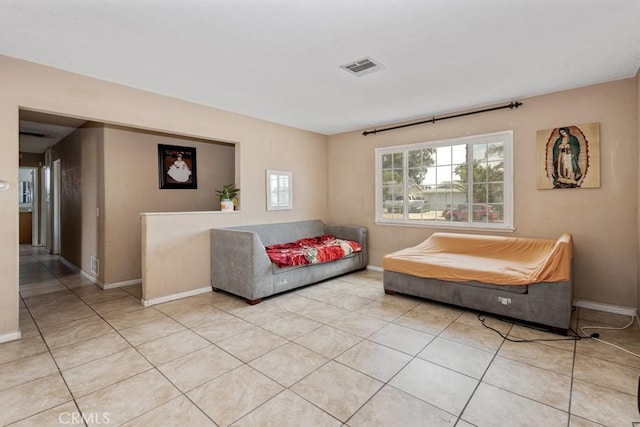1030 Perrisito St, Perris, CA 92570 - living area with baseboards and light tile patterned floors